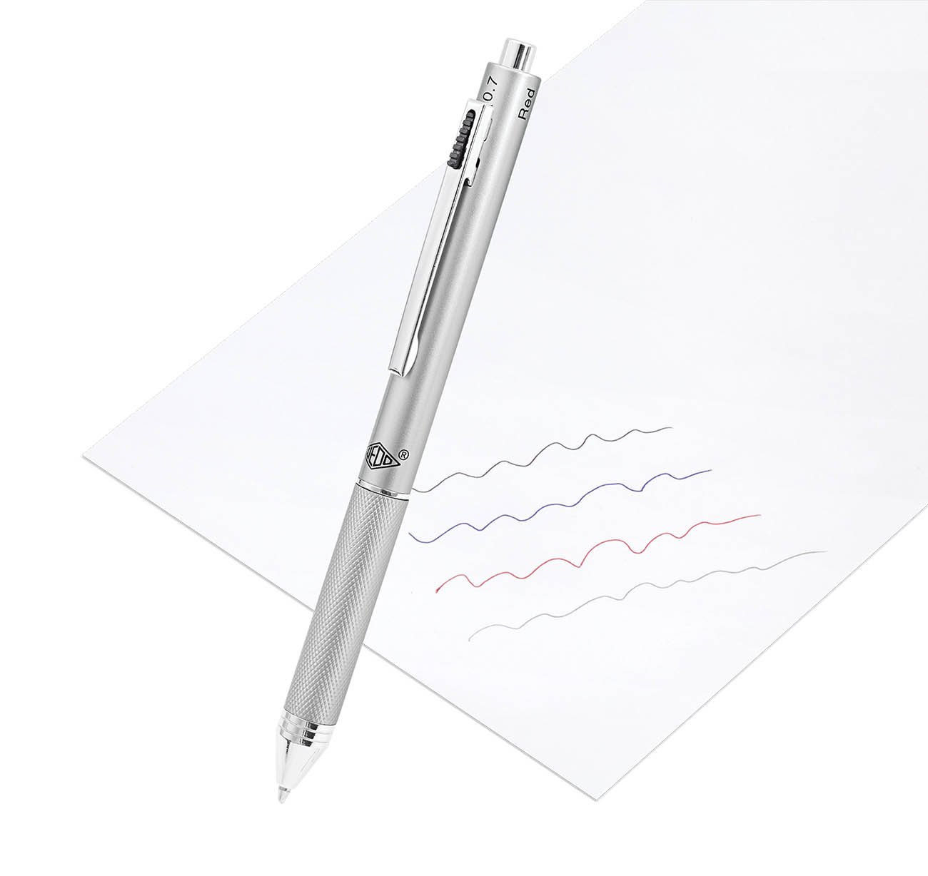 Silver mechanical pencil with knurled grip drawing blue, purple, red and gray squiggles on white paper